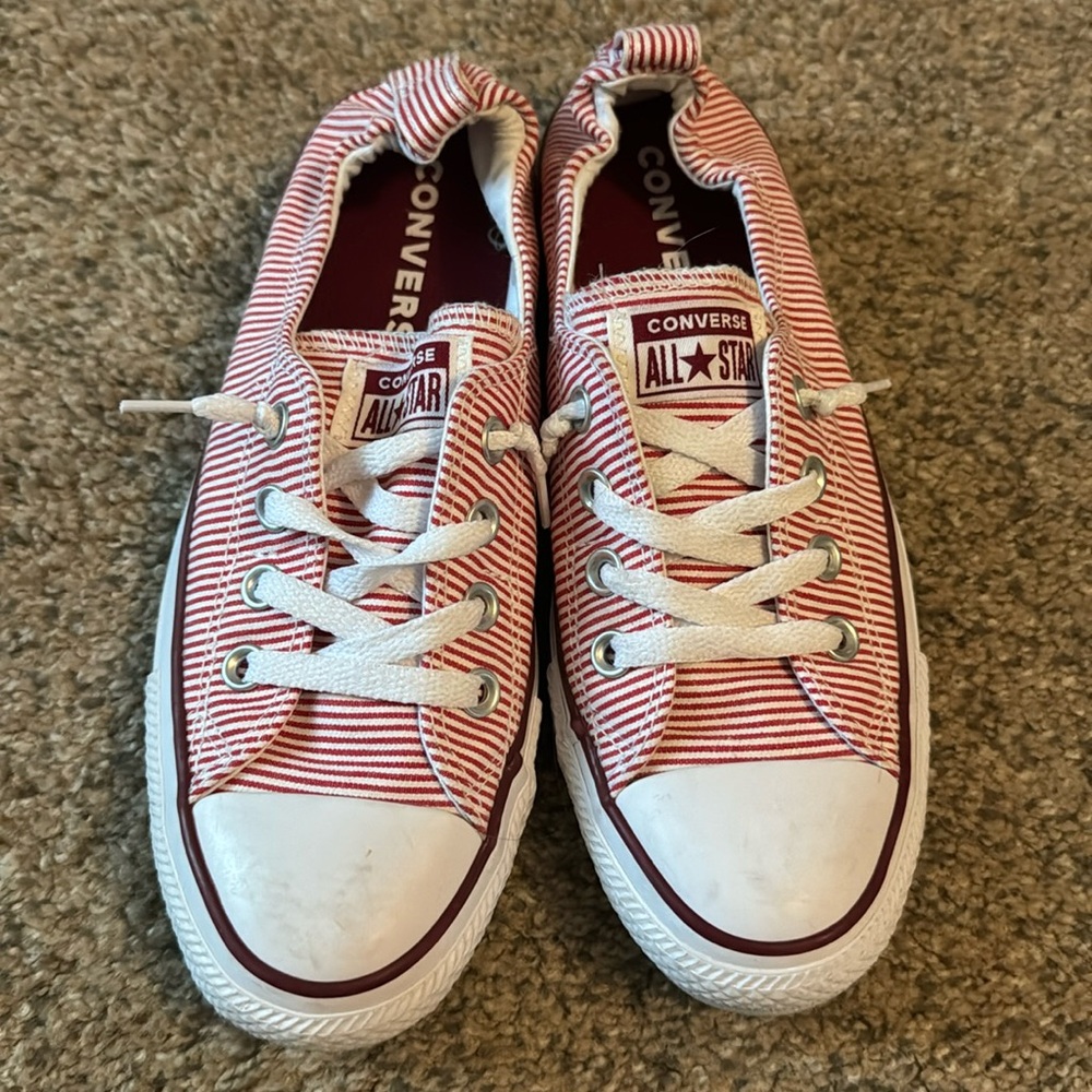 Red and white striped converse all star slip ons